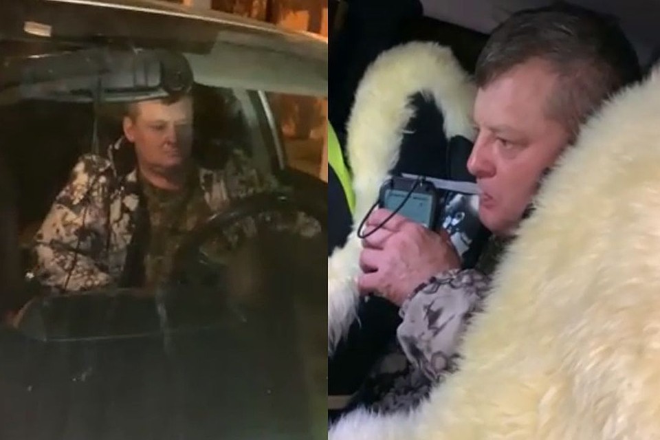 Майор дует в прибор, который считает неисправным.