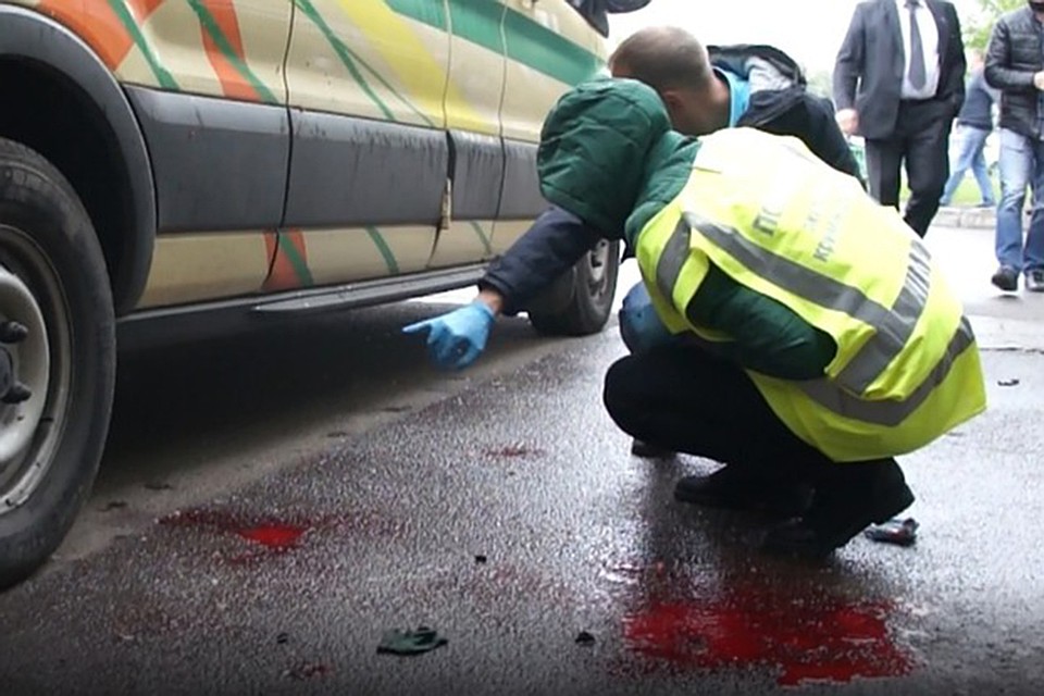 После нападение на инкассаторов в Красноярске возбуждено уголовное дело. Фото: стоп-кадр видео ГУ МВД России по Красноярскому краю.