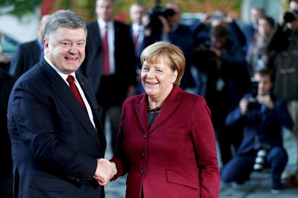 Ангела Меркель с Петром Порошенко еще перед встречей "нормандской четверки" в Берлине заявляли, что "чуда" от нынешних переговоров не ожидают