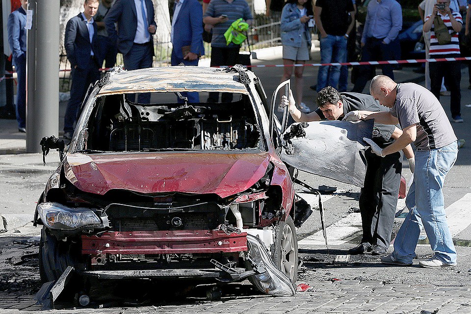 Работа криминалистов на месте ЧП в центре Киева. Фото: REUTERS