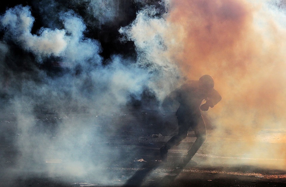 Массовые беспорядки охватили столицу Чили. Фото: REUTERS